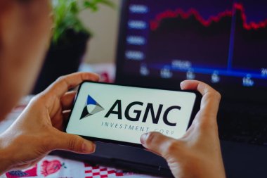 August 15, 2022, Brazil. In this photo illustration, the AGNC Investment Corp. logo is displayed on a smartphone screen