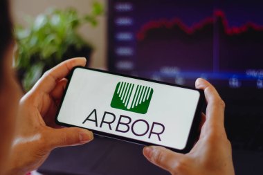 August 15, 2022, Brazil. In this photo illustration, the Arbor Realty Trust logo is displayed on a smartphone screen