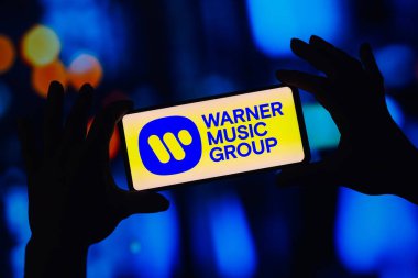September 6, 2022, Brazil. In this photo illustration, the Warner Music Group logo is displayed on a smartphone screen