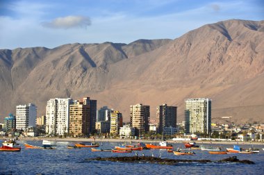 Iquique behind a huge dune, northern Chile clipart
