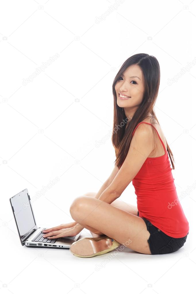 Asian Teen Using Laptop