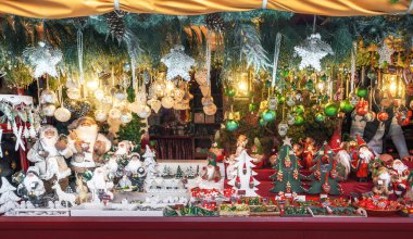 Nuremberg, Germany - Dec 09, 2019: Wooden toys and xmas decorations at Christmas Market Stall - Nuremberg, Bavaria, Germany clipart