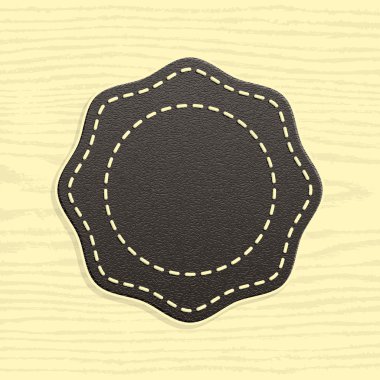 retro vintage tarzı boş deri rozeti. etiketleri şablon üstün kaliteli ve memnuniyetini garanti. Çokgen şeklin ahşap doku arka plan üzerinde yuvarlak.