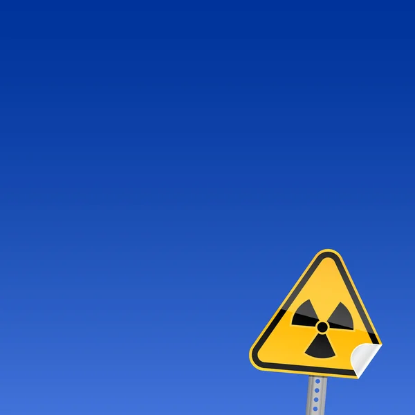 Yellow road warning sign with radiation symbol — Stock Vector