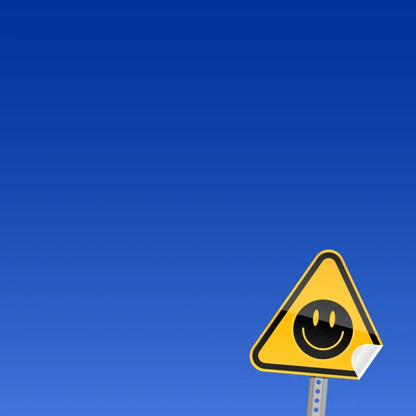 Pequeno sinal de aviso de estrada amarelo com símbolo de sorriso preto com canto curvo — Vetor de Stock