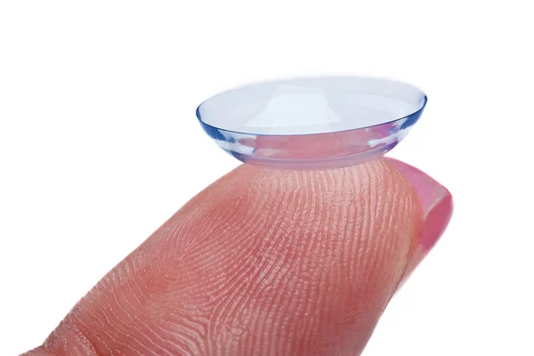 Woman holds a Contact Lens Royalty Free Stock Images