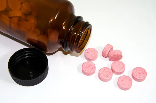 Pills and bottle — Stock Photo, Image