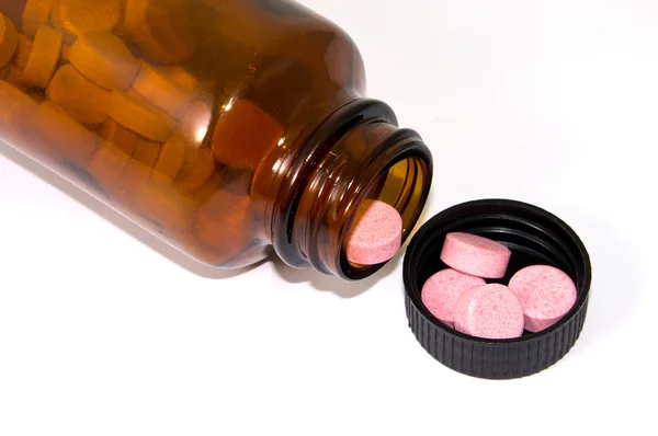 Pills and bottle — Stock Photo, Image