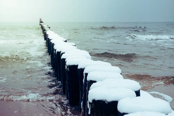 Wooden Groyne Beach Covered Snow Winter Time — стоковое фото