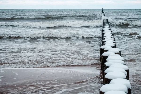 Wooden Groyne Beach Covered Snow Winter Time — стоковое фото