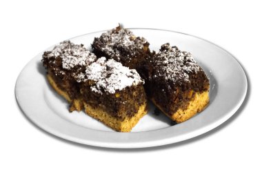 Four pieces of cake on a table