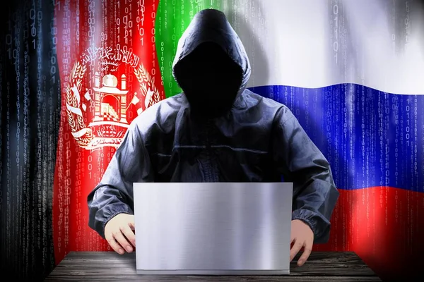 Hacker Anónimo Trabajando Una Computadora Portátil Banderas Afganistán Rusia —  Fotos de Stock