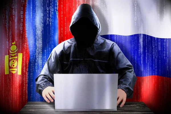 Hacker Anónimo Trabajando Una Computadora Portátil Banderas Mongolia Rusia —  Fotos de Stock