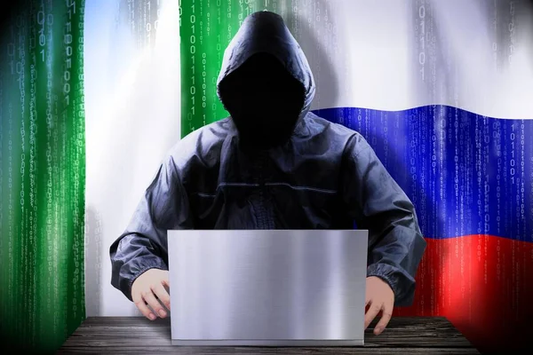 Hacker Anónimo Trabajando Una Computadora Portátil Banderas Nigeria Rusia —  Fotos de Stock