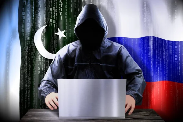Hacker Anónimo Trabajando Una Computadora Portátil Banderas Pakistán Rusia —  Fotos de Stock
