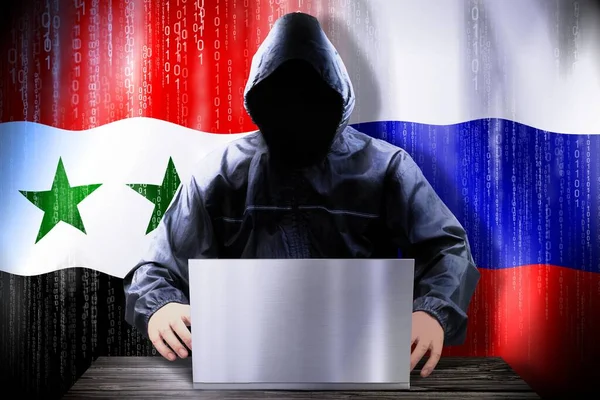 Anonymous Hacker Working Laptop Flags Syria Russia — Stock Photo, Image