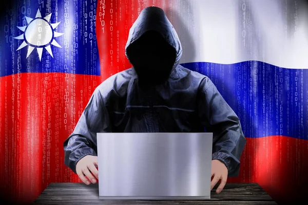 Anonymous Hacker Working Laptop Flags Taiwan Russia — Stock Photo, Image