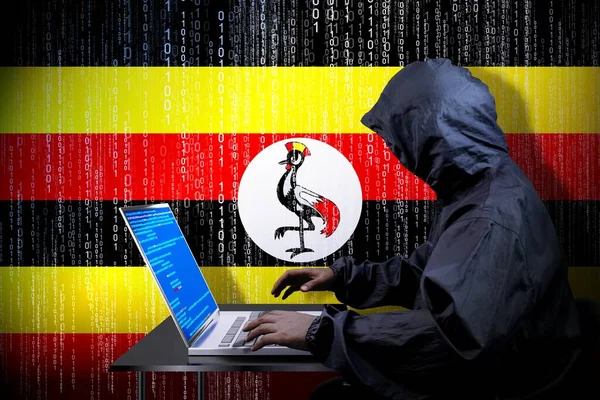 Anónimo Hacker Encapuchado Bandera Uganda Código Binario Concepto Ataque Cibernético —  Fotos de Stock