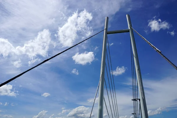 Modern cable-stayed bridge, sky with clouds