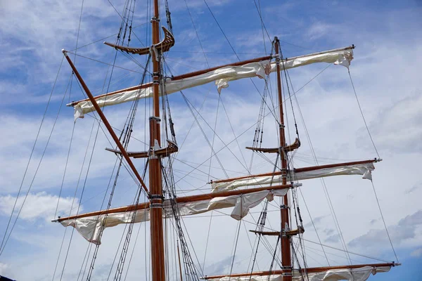 Tall Ship Mast Rolled Sails Sky Background — Φωτογραφία Αρχείου