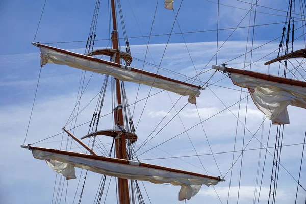 Tall Ship Mast Rolled Sails Sky Background — 图库照片