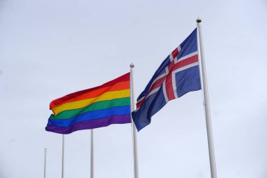 Iceland, Reykjavik, August 7th 2022 - Pride month, rainbow and icelandic flags