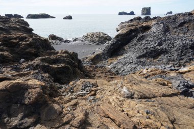 Rocks at Reynisfjara Black Beach in Iceland