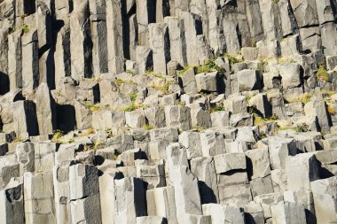 Basalt rocks at Reynisfjara Black Beach in Iceland - close-up