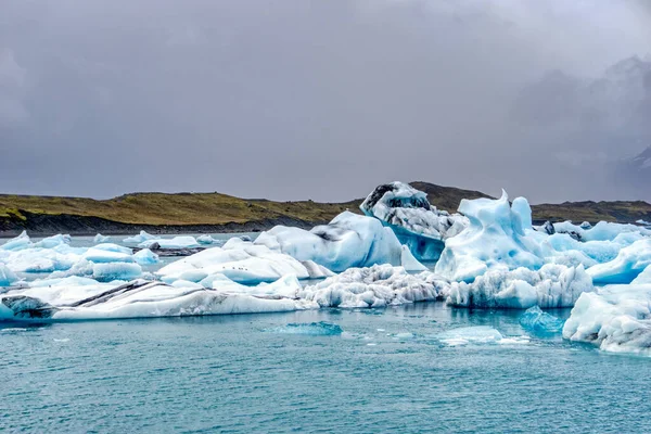Ice floes at Jokulsarlon glacial lagoon in Iceland - most famoust tourist attraction