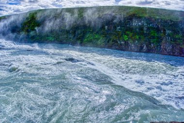 Gullfoss waterfall located in canyon on Hvita river, Iceland - hdr photograph
