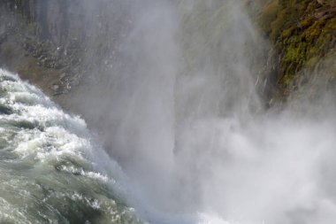 Splash of droplets, water mist - Gullfoss waterfall in Iceland