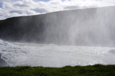Splash of droplets, water mist - Gullfoss waterfall in Iceland