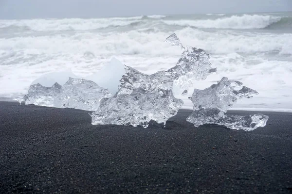 Diamond Beach in Iceland - black sand volcanic beach with iceberg chunks