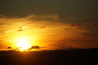 Sunset sky over field in Iceland