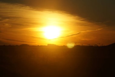 Sunset sky over field in Iceland