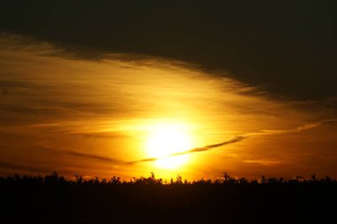 Sunset sky over field in Iceland