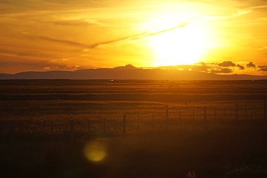Sunset sky over field in Iceland