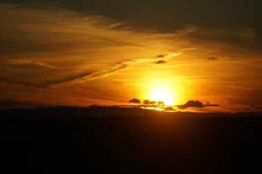 Sunset sky over field in Iceland