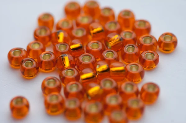 Orange glass beads — Stock Photo, Image