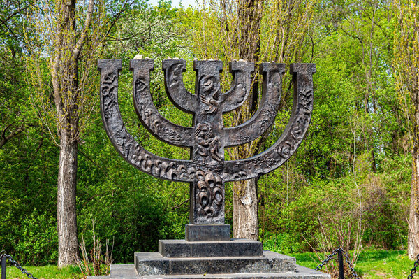 Kiev Ukraine April 20 2021. Memorial Babyn Yar the menorah of the fallen Jews of the concentration camp. Menorah candlestick. Holocaust. Place of massive repression of Jews. Babiy yar.