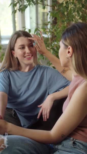 Lgbt Women Sit Together Living Room Talk Each Other Smiling — Stock Video