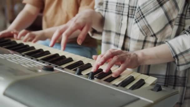 Mom Spends Time Child Play Synthesizer Together Woman Looks Calm — Stock Video