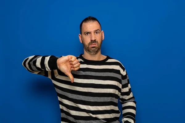 Spanish Man Beard Displeased Posing Isolated Blue Wall Background Studio — Fotografia de Stock