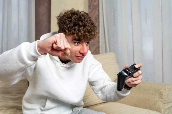 Frustrated Young Man Playing Video Games Sitting Sofa Holding Remote — Stock Photo, Image