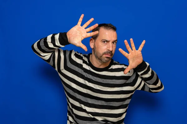 Serious Concentrated Man His Hands Front His Face Sign Defense — Fotografia de Stock