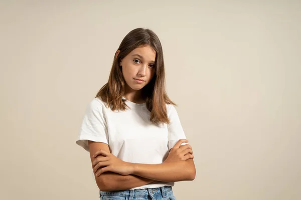 Portrait Angry Hispanic Teenage Girl Arms Crossed Warning Gesture Isolated — Zdjęcie stockowe