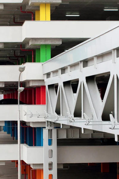 Multi-level car park and a metallic bridge