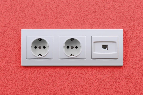 Electric and internet outlets on wall — Stock Photo, Image