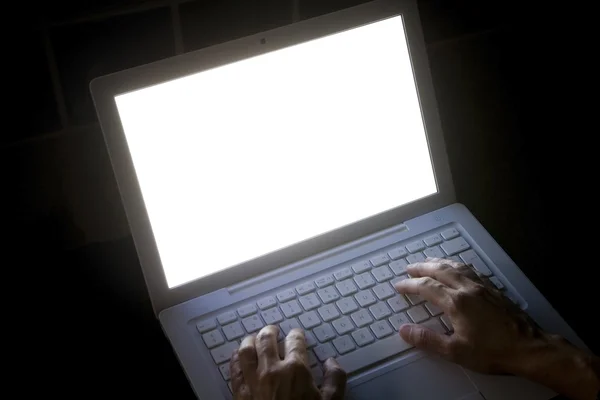 Typing on Laptop at night — Stock Photo, Image