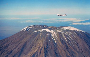 747 overhead Mount Kilimanjaro in Africa clipart